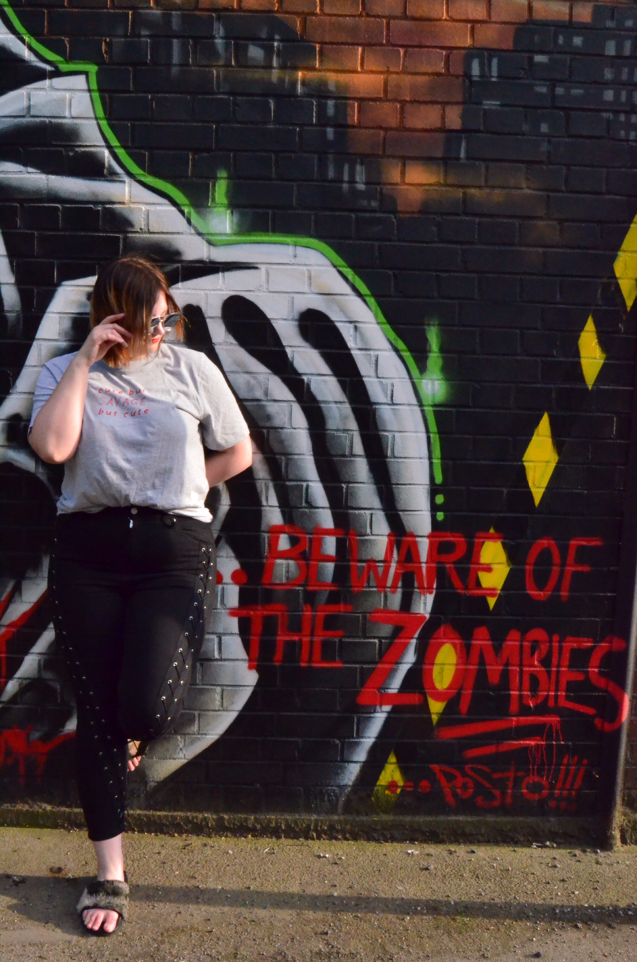 Rock on Ruby cute but savage but cute t shirt, Topshop lace up jeans, Public Desire multi colour slides, silver mirror cat eye sunglasses