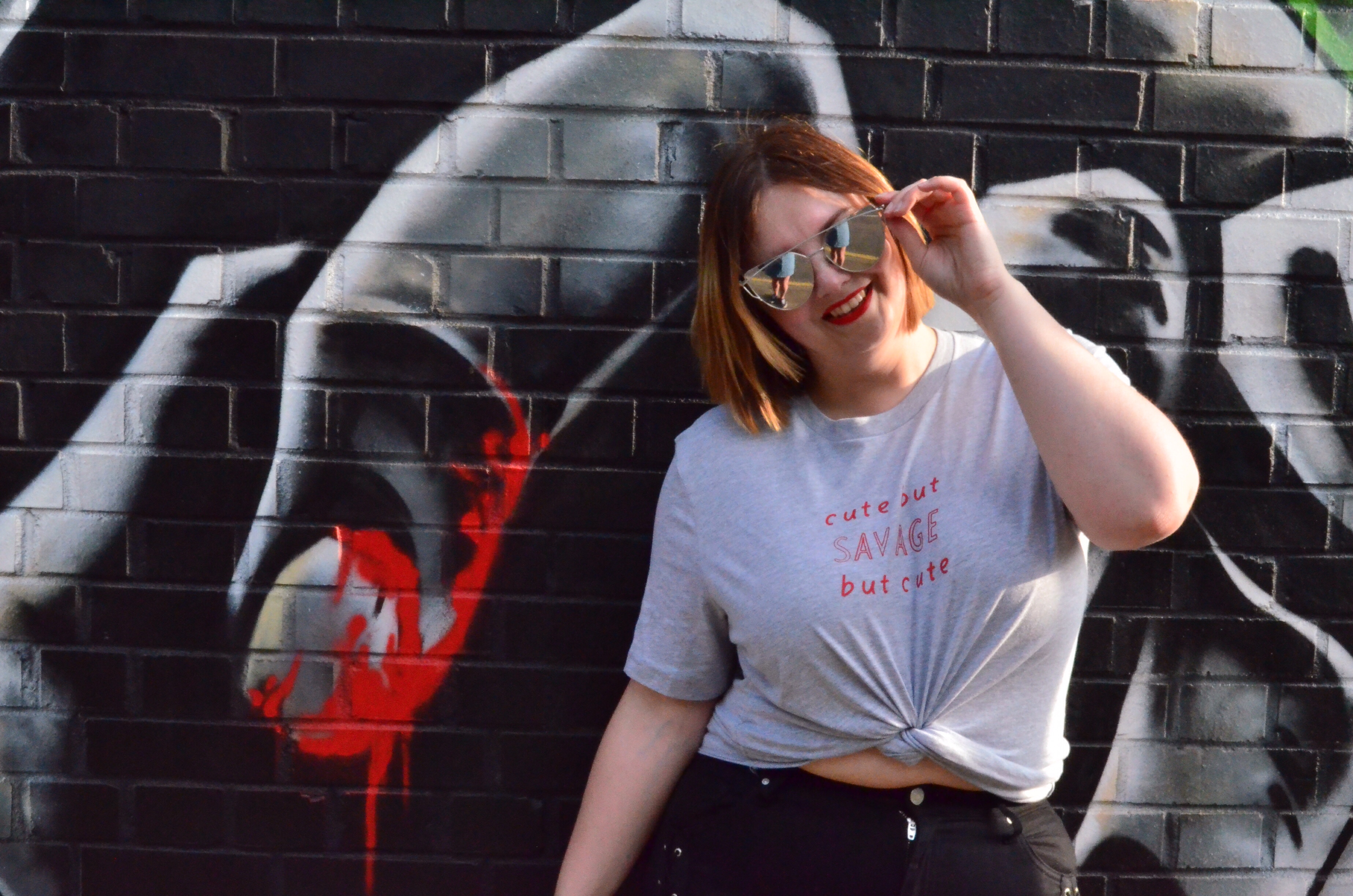 Rock on Ruby cute but savage but cute t shirt, Topshop lace up jeans, Public Desire multi colour slides, silver mirror cat eye sunglasses