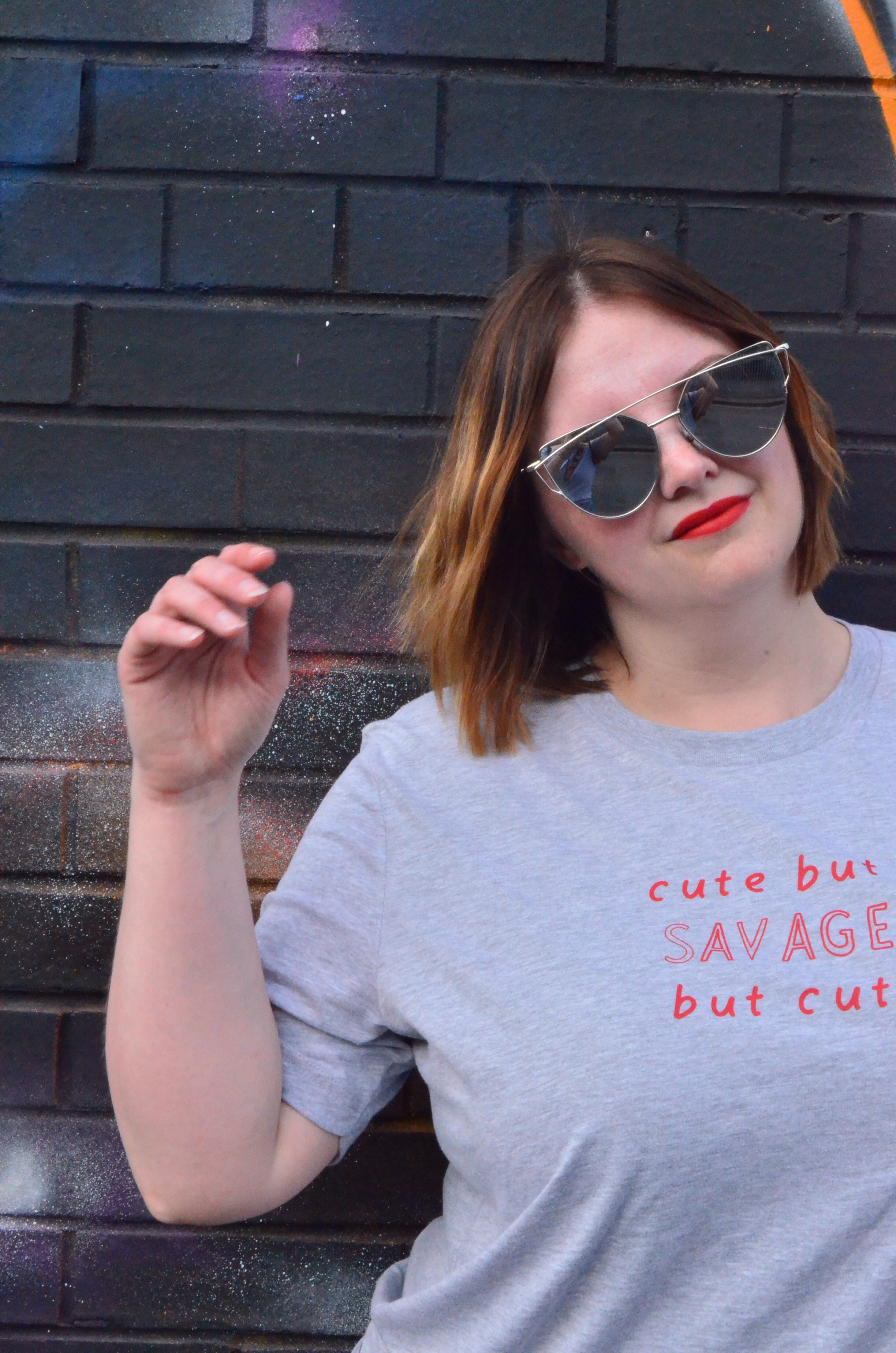 Rock on Ruby cute but savage but cute t shirt, Topshop lace up jeans, Public Desire multi colour slides, silver mirror cat eye sunglasses